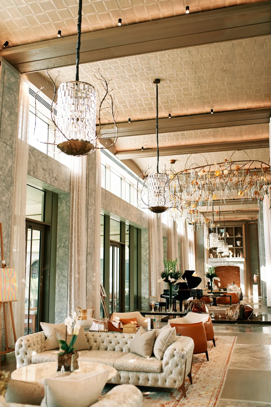Elegant hotel lobby with warm lighting and contemporary seating